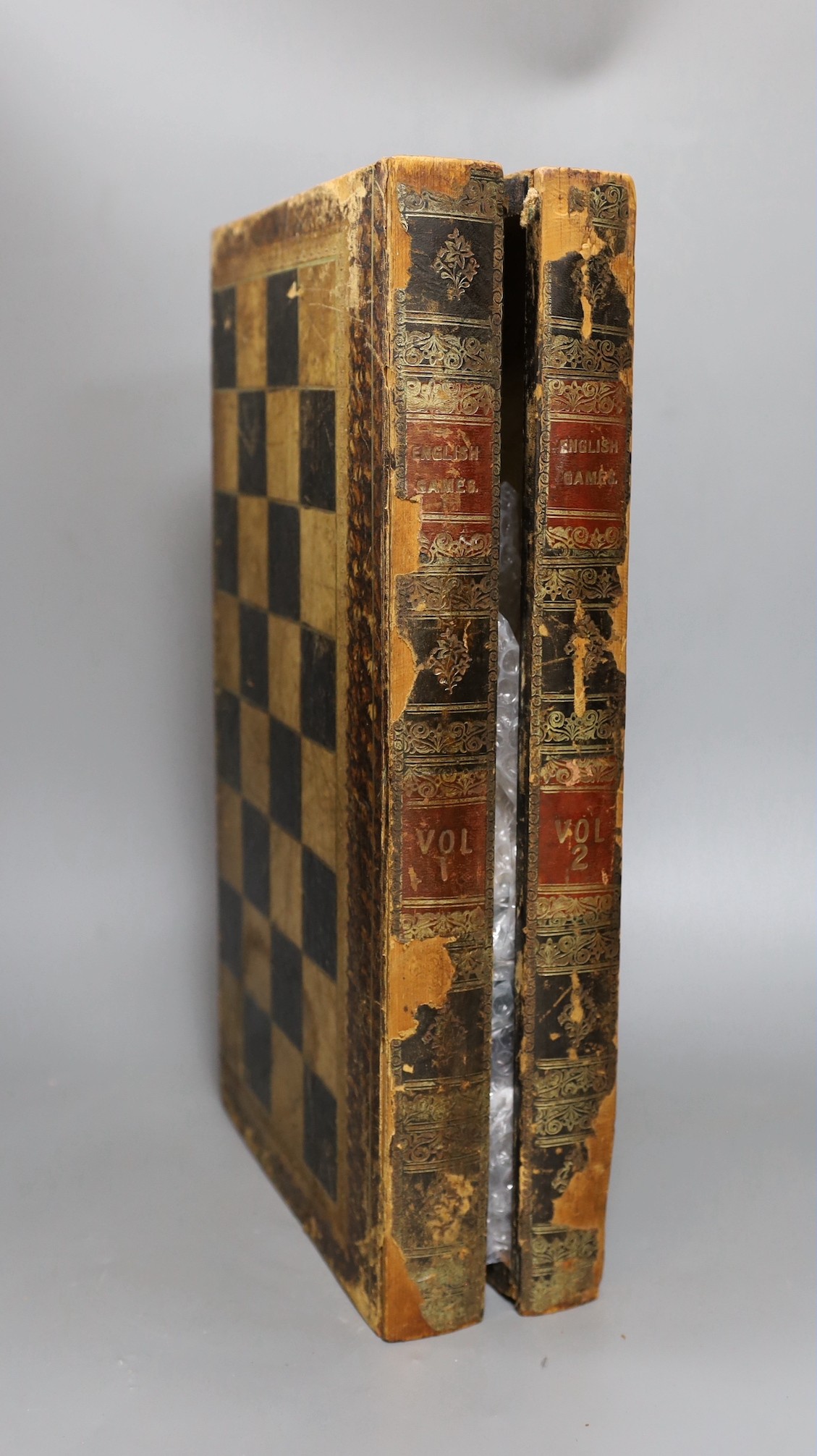 A 19th century faux book chessboard and turned wood chess set